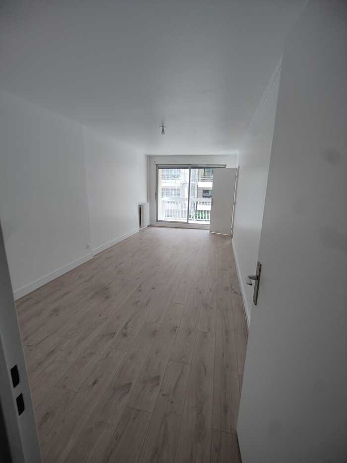 Remplacement parquet Asnières - ancien moquette remplacée par parquet stratifié effet bois